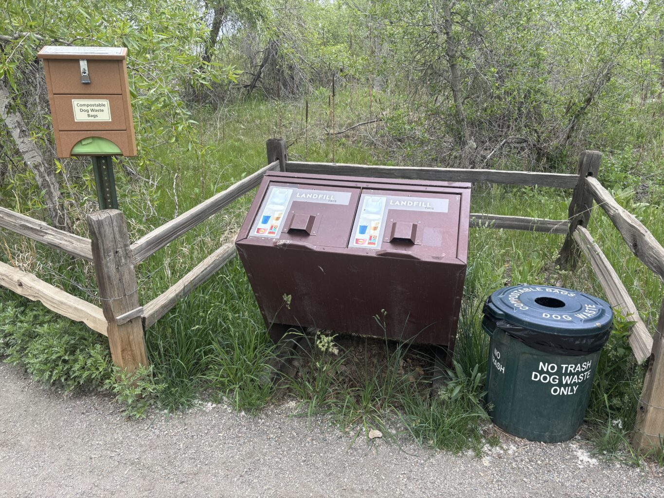 Pet waste station with compostable pet waste bags.